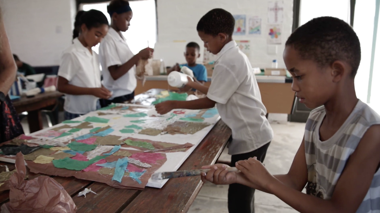 Children participating in a site-specific creative process at !Khwa ttu.
